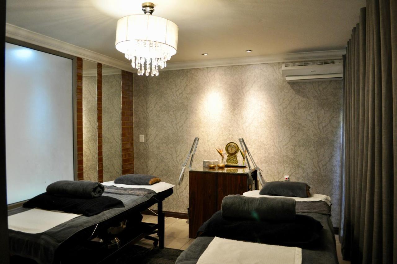 Menlyn Boutique Hotel Pretoria Exterior photo A massage room at a spa