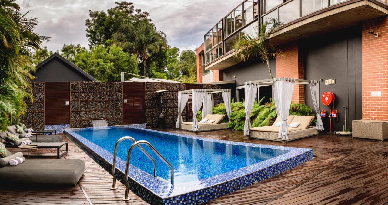 Menlyn Boutique Hotel Pretoria Exterior photo The swimming pool at the hotel