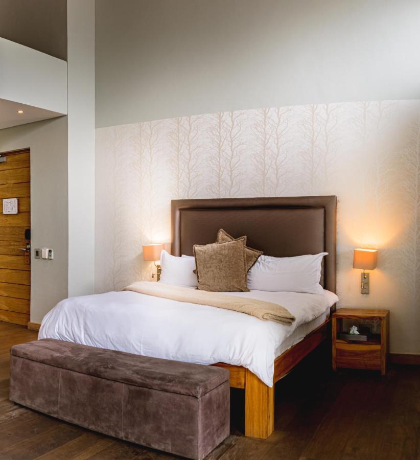 Menlyn Boutique Hotel Pretoria Exterior photo A bedroom at the Protea Hotel, Centurion
