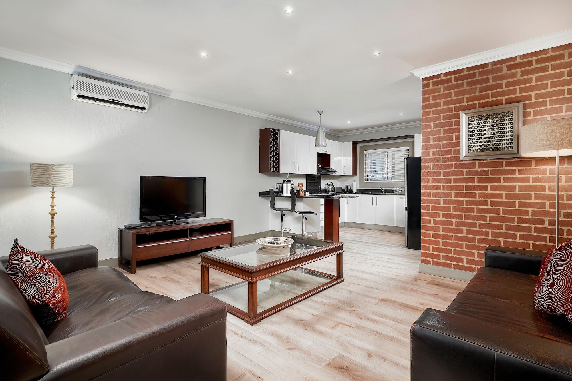 Menlyn Boutique Hotel Pretoria Exterior photo A typical apartment at the residence