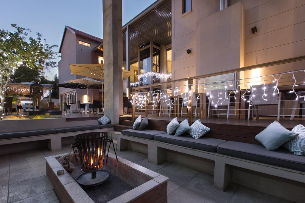 Menlyn Boutique Hotel Pretoria Exterior photo The outdoor lounge at the hotel
