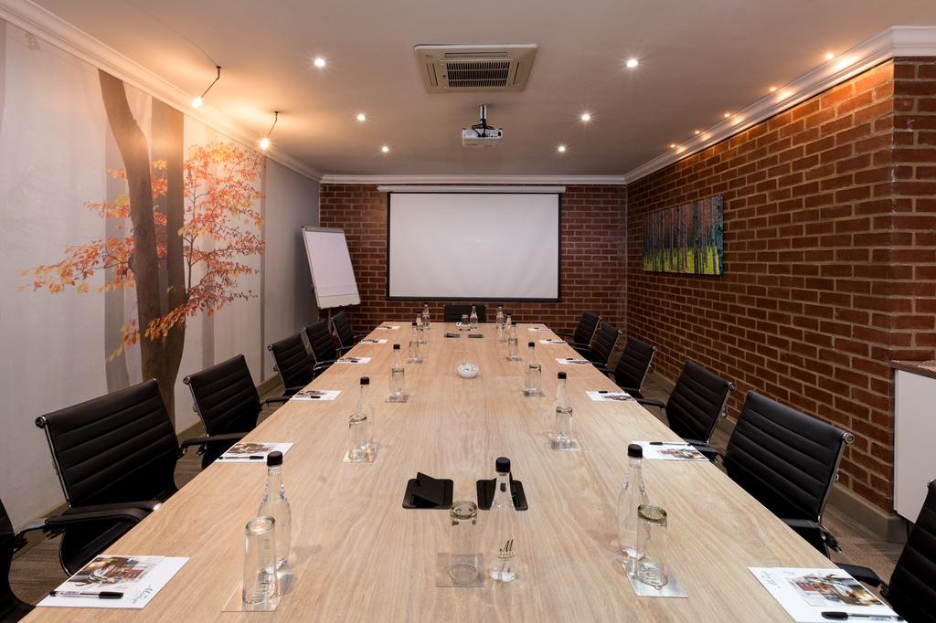 Menlyn Boutique Hotel Pretoria Exterior photo The Boardroom at the Old Bank Hotel