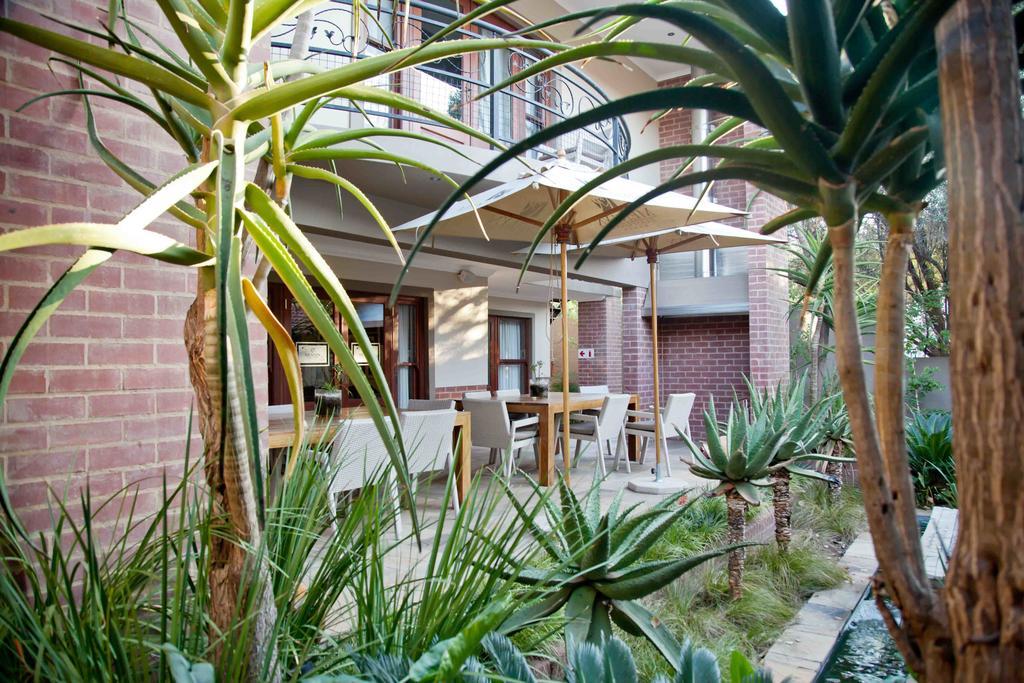 Menlyn Boutique Hotel Pretoria Exterior photo The courtyard of the house
