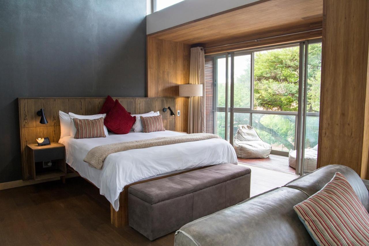 Menlyn Boutique Hotel Pretoria Exterior photo A bedroom at the Cape of Good Hope