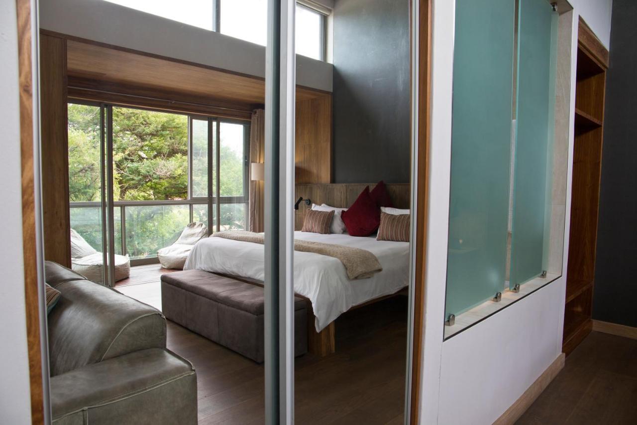 Menlyn Boutique Hotel Pretoria Exterior photo A bedroom at the hotel